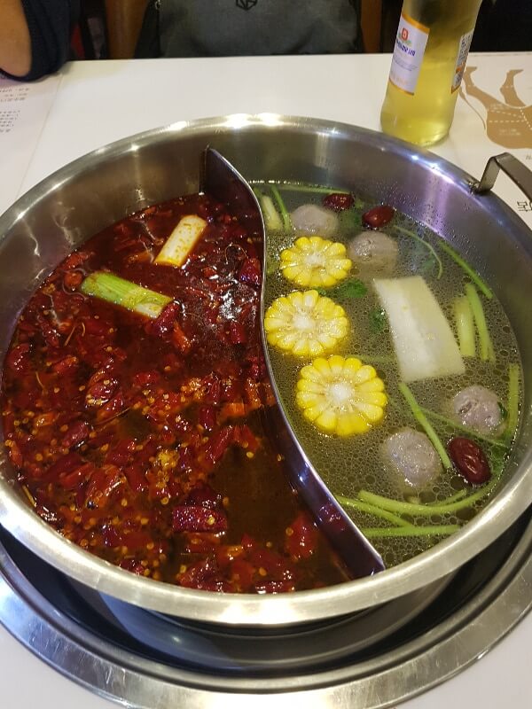 hot pot, one side is spicy the other side isn't 