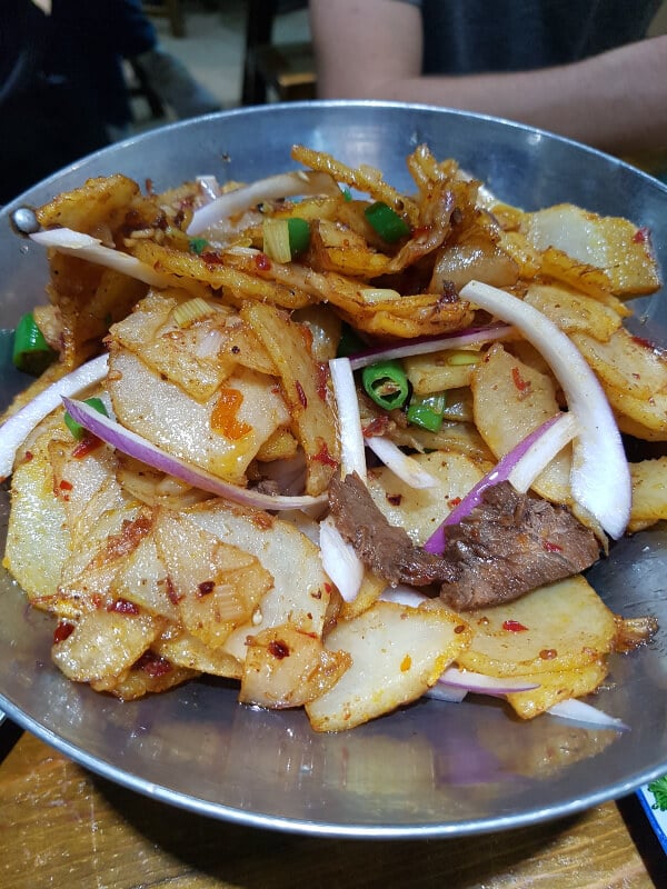 fried potatoes in Zhengzhou: beef, onions, spice and some sort of sauce 