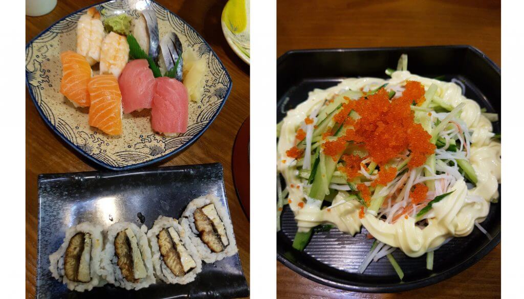 There is some yummy food dishes: a plate of grilled eel sushi. a plate of assorted colorful sushi and a dish of crab roe salad 