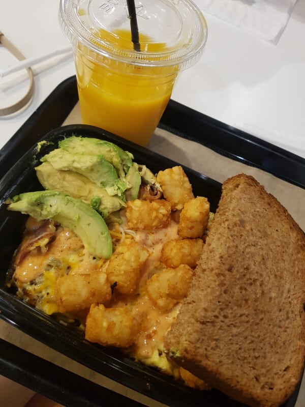 Southern California Itinerary: Breakfast at the Flying Yolk: Fresh squeezed OJ, tater tots, eggs with cheese, toast and guacamole. 