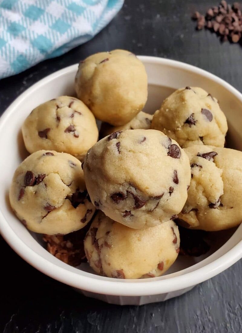 A bowl of chocolate chip cookie dough bites.